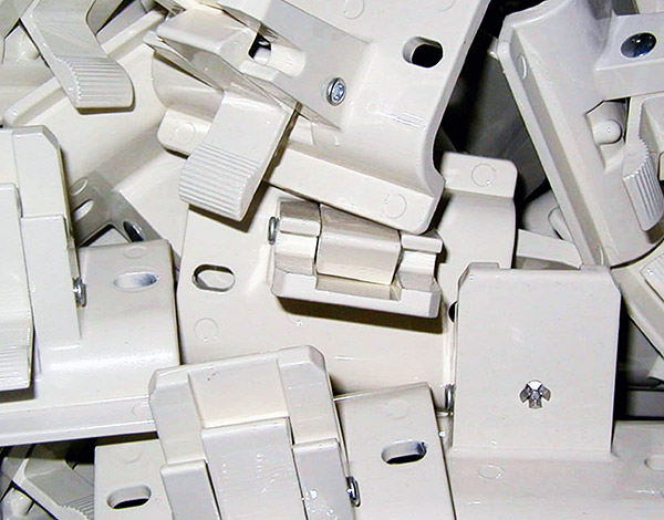 White components piled, but assembled, to show our offerings. 