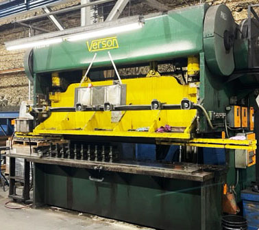 Green and yellow 150-Ton punch press.